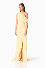 Brunette model wearing the Isadora Off The Shoulder Gown in Butter Yellow side shot 