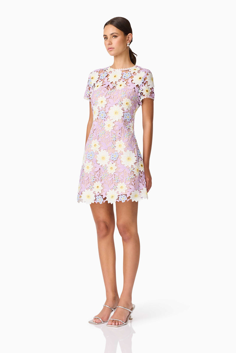 Brunette model wearing SIGRID MINI SHIFT DRESS side shot