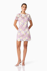 Brunette model wearing SIGRID MINI SHIFT DRESS front shot hands behind dress