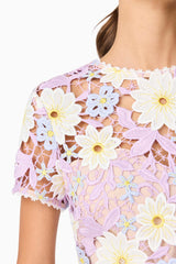 Brunette model wearing SIGRID MINI SHIFT DRESS detailing shot