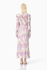 Blonde model wearing Sigrid Long Sleeve Midi Dress in Purple back shot