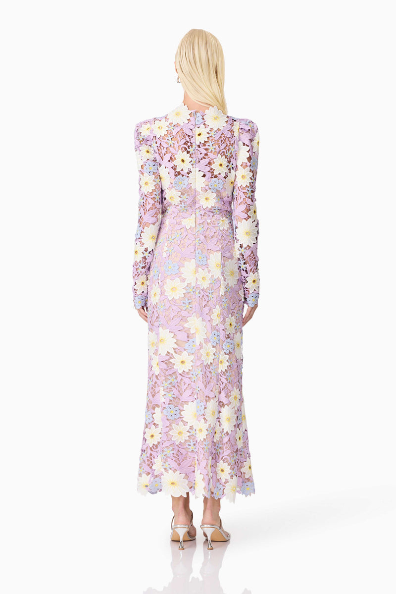 Blonde model wearing Sigrid Long Sleeve Midi Dress in Purple back shot