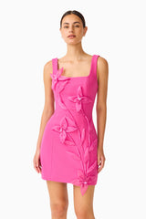 Brunette model wearing the Ilaria Party Mini Dress in Pink close up shot