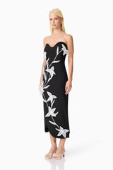 Blonde model wearing Ilaraia Sweetheart Midi Dress in Black side shot
