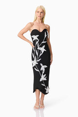 Blonde model wearing Ilaraia Sweetheart Midi Dress in Black front shot hand on hip