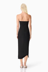 Blonde model wearing Ilaraia Sweetheart Midi Dress in Black back shot
