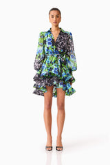 Brunette model wearing Briony Long Sleeve Mini Dress in Black Floral front shot