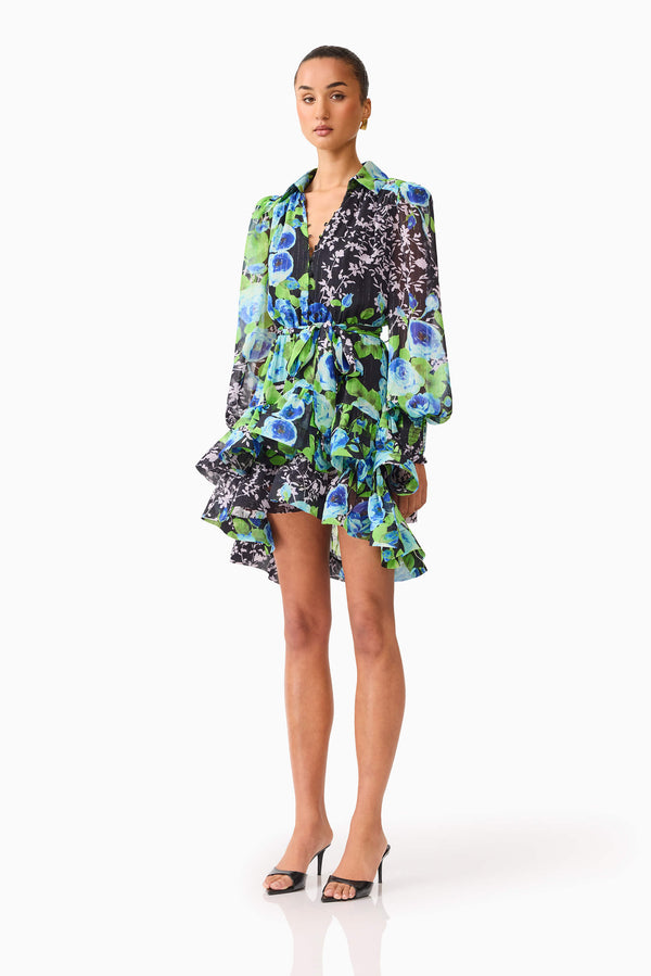 Brunette model wearing Briony Long Sleeve Mini Dress in Black Floral side shot