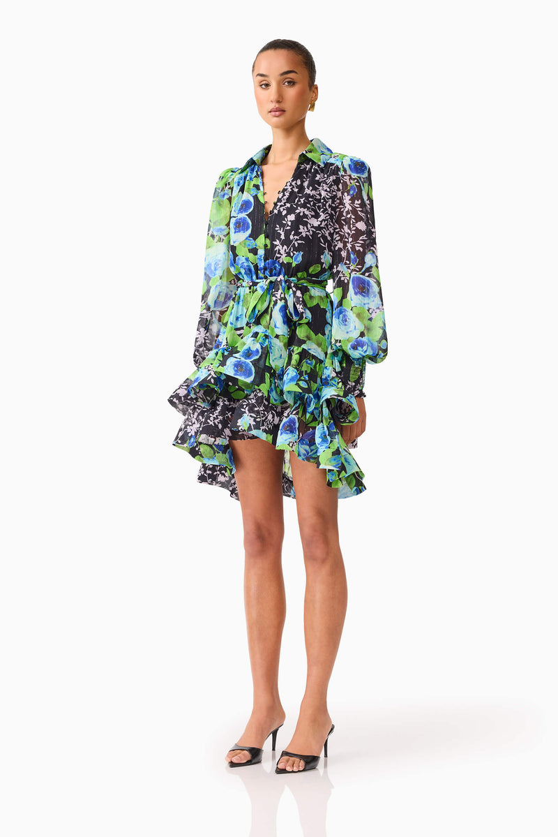 Brunette model wearing Briony Long Sleeve Mini Dress in Black Floral side shot