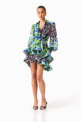 Brunette model wearing Briony Long Sleeve Mini Dress in Black Floral posed shot