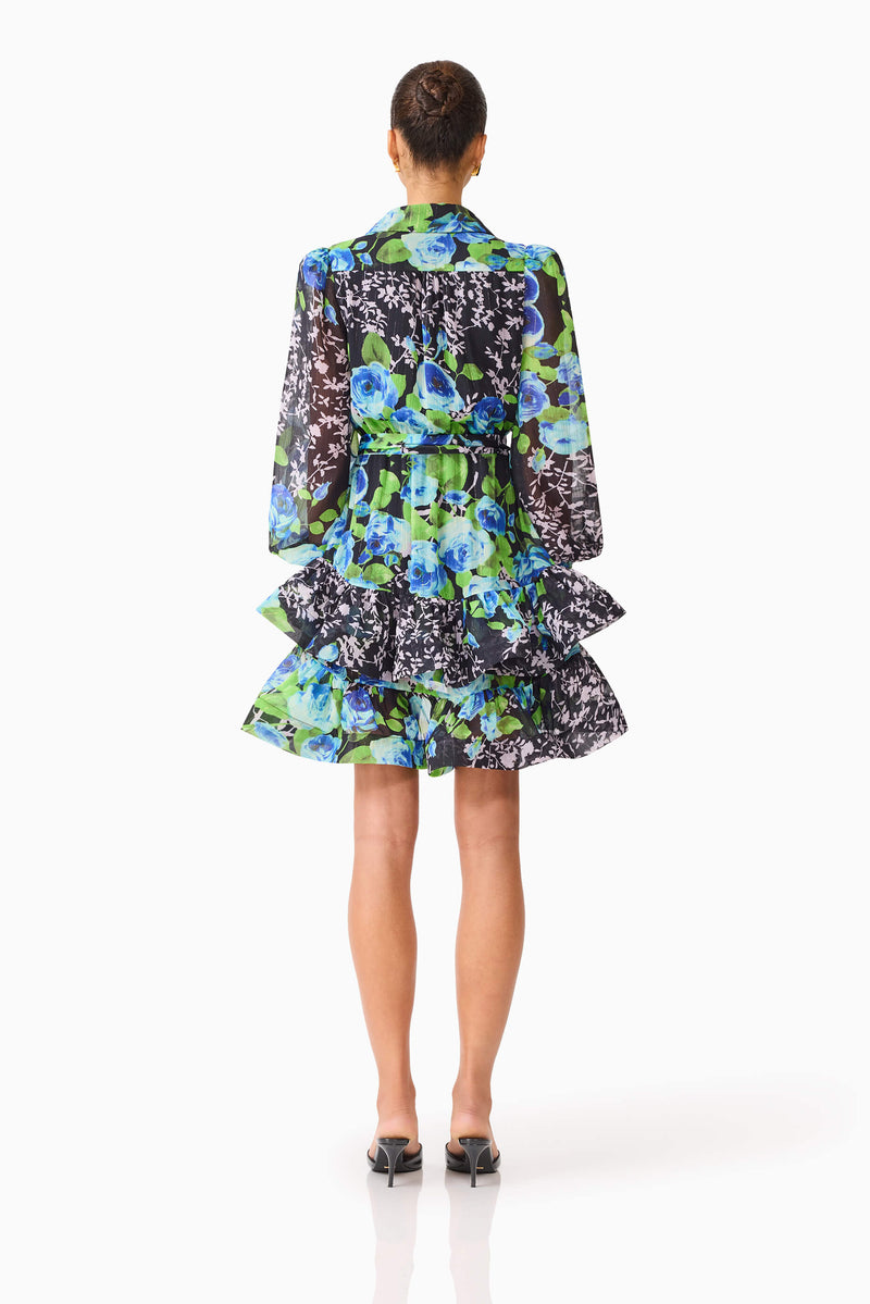 Brunette model wearing Briony Long Sleeve Mini Dress in Black Floral back shot
