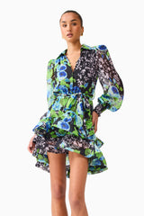 Brunette model wearing Briony Long Sleeve Mini Dress in Black Floral close up shot