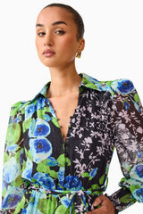 Brunette model wearing Briony Long Sleeve Mini Dress in Black Floral extreme close up shot