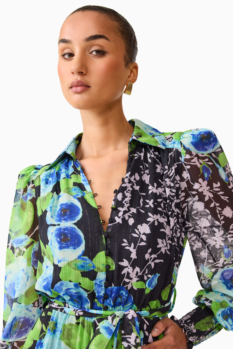 Brunette model wearing Briony Long Sleeve Mini Dress in Black Floral extreme close up shot