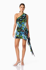 Brunette Model Wearing Briony Asymmetrical Mini Dress in Black & Blue Floral Posed Shot