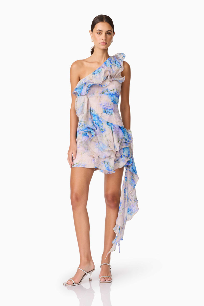 Brunette Model Wearing Briony Asymmetrical Mini Dress in Floral posed Shot
