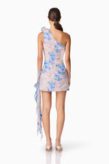 Brunette Model Wearing Briony Asymmetrical Mini Dress in Floral Back Shot