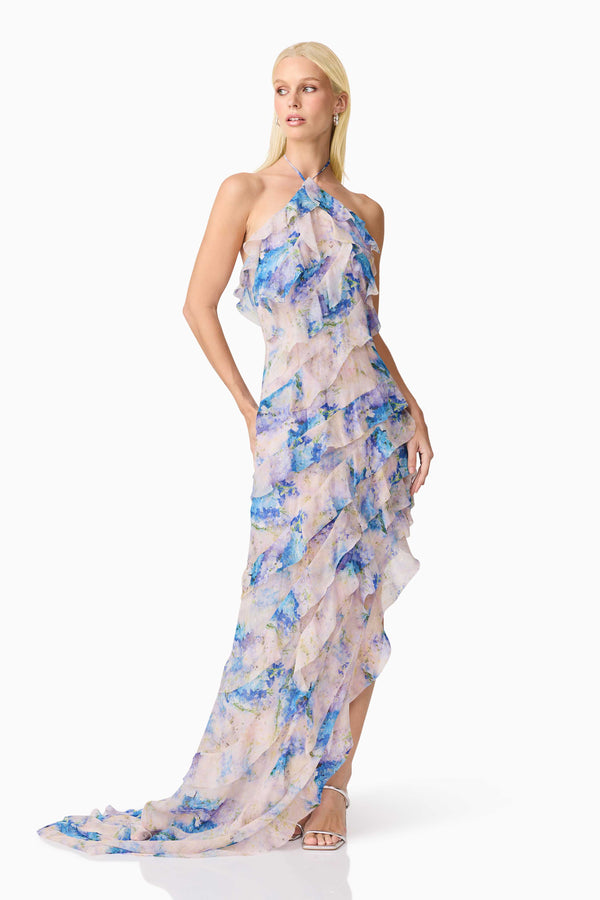 Blonde Model Wearing Briony Asymmetrical Maxi Dress in Floral Posed Shot