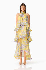 Brunette model wearing the Briony Tiered Gown in Yellow Print front shot