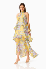 Brunette model wearing the Briony Tiered Gown in Yellow Print posed shot