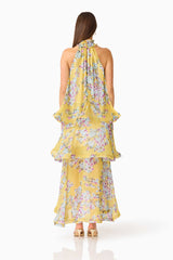 Brunette model wearing the Briony Tiered Gown in Yellow Print back shot