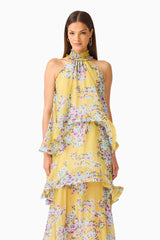 Brunette model wearing the Briony Tiered Gown in Yellow Print close up shot