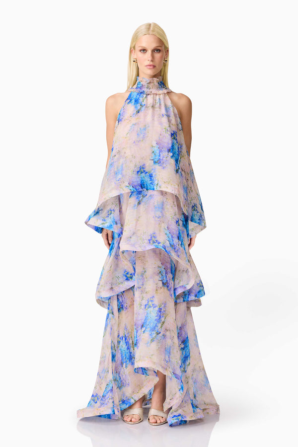 Blonde Model wearing Briony Tiered Gown in Pink & Blue Floral Front shot