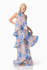 Blonde Model wearing Briony Tiered Gown in Pink & Blue Floral posed shot