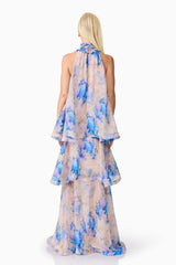 Blonde Model wearing Briony Tiered Gown in Pink & Blue Floral back shot