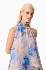 Blonde Model wearing Briony Tiered Gown in Pink & Blue Floral detail shot