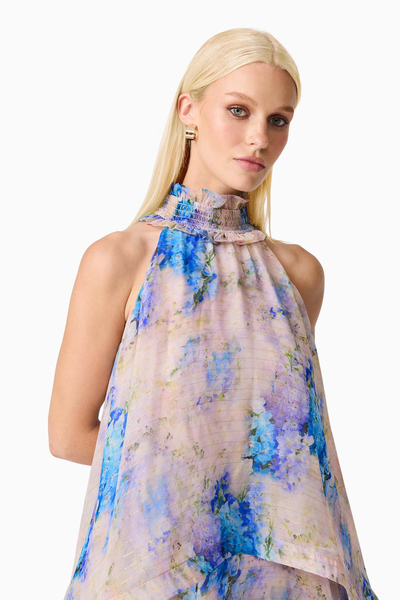 Blonde Model wearing Briony Tiered Gown in Pink & Blue Floral detail shot
