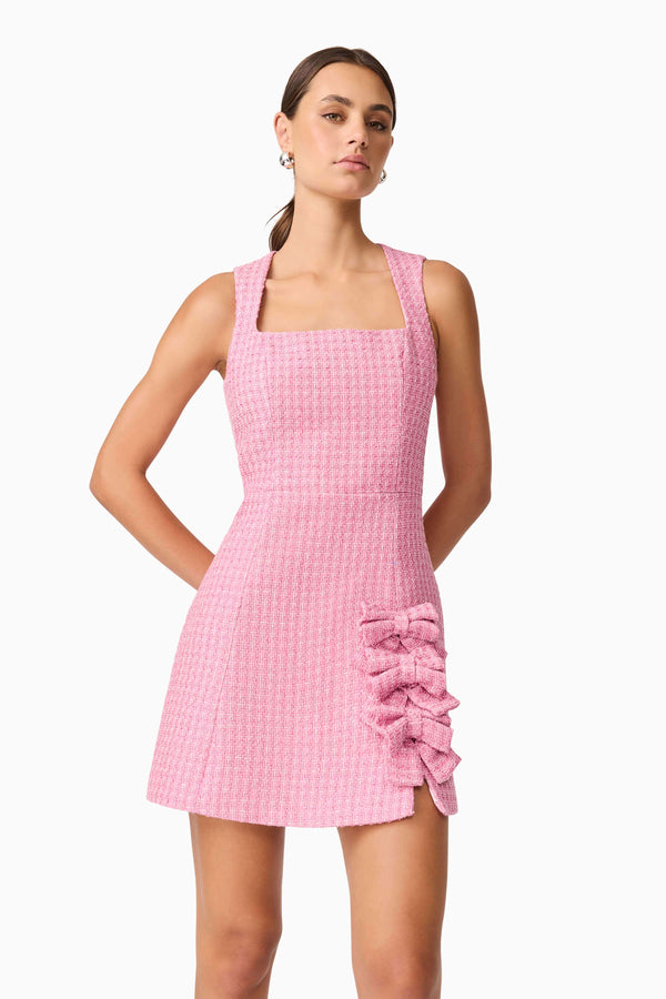 Brunette model wearing Alia A Line Mini Dress in Pink close up shot