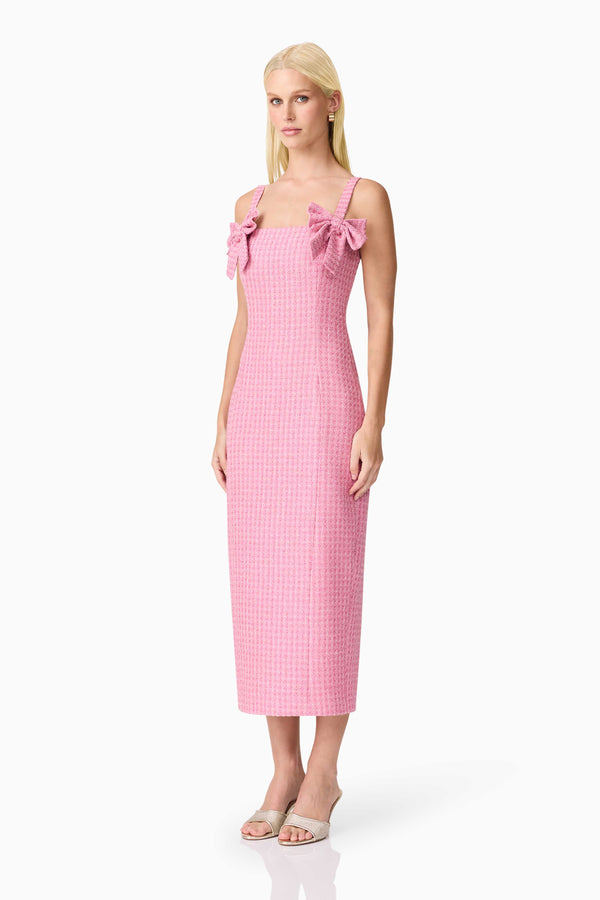 Blonde model wearing Alia Fitted Midi Dress In Pink side shot