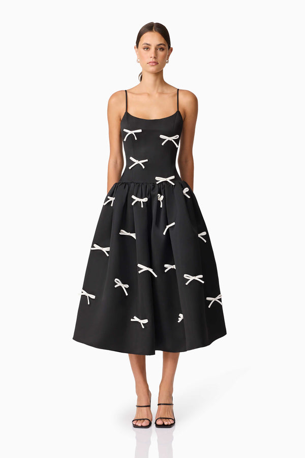 Brunette model wearing Ursula A-Line Midi Dress in Black front shot