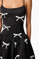 Brunette model wearing Ursula A-Line Midi Dress in Black detail shot