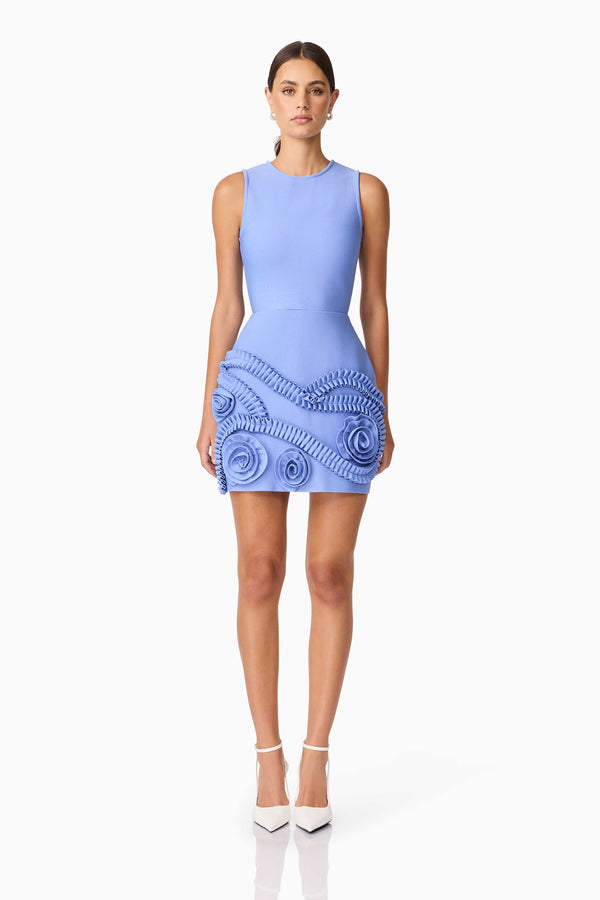 Brunette model wearing Sonya Tulip Mini Dress in Blue front shot