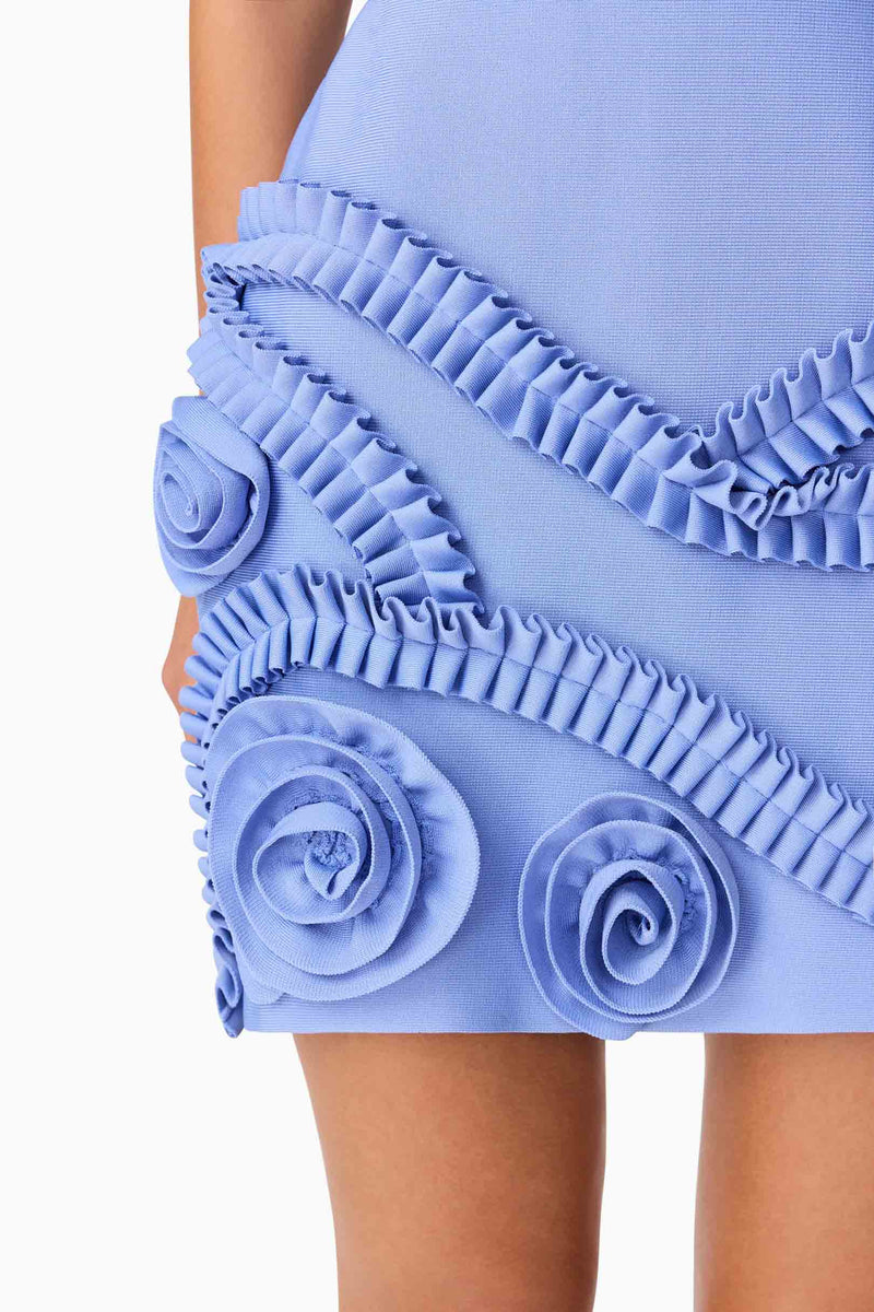 Brunette model wearing Sonya Tulip Mini Dress in Blue detail shot