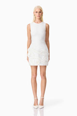 Blonde model wearing the Sonya Tulip Mini Dress in White front shot
