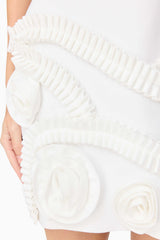 Blonde model wearing the Sonya Tulip Mini Dress in White detail shot