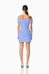 Brunette model wearing Sonya Off The Shoulder Mini Dress in Blue back shot
