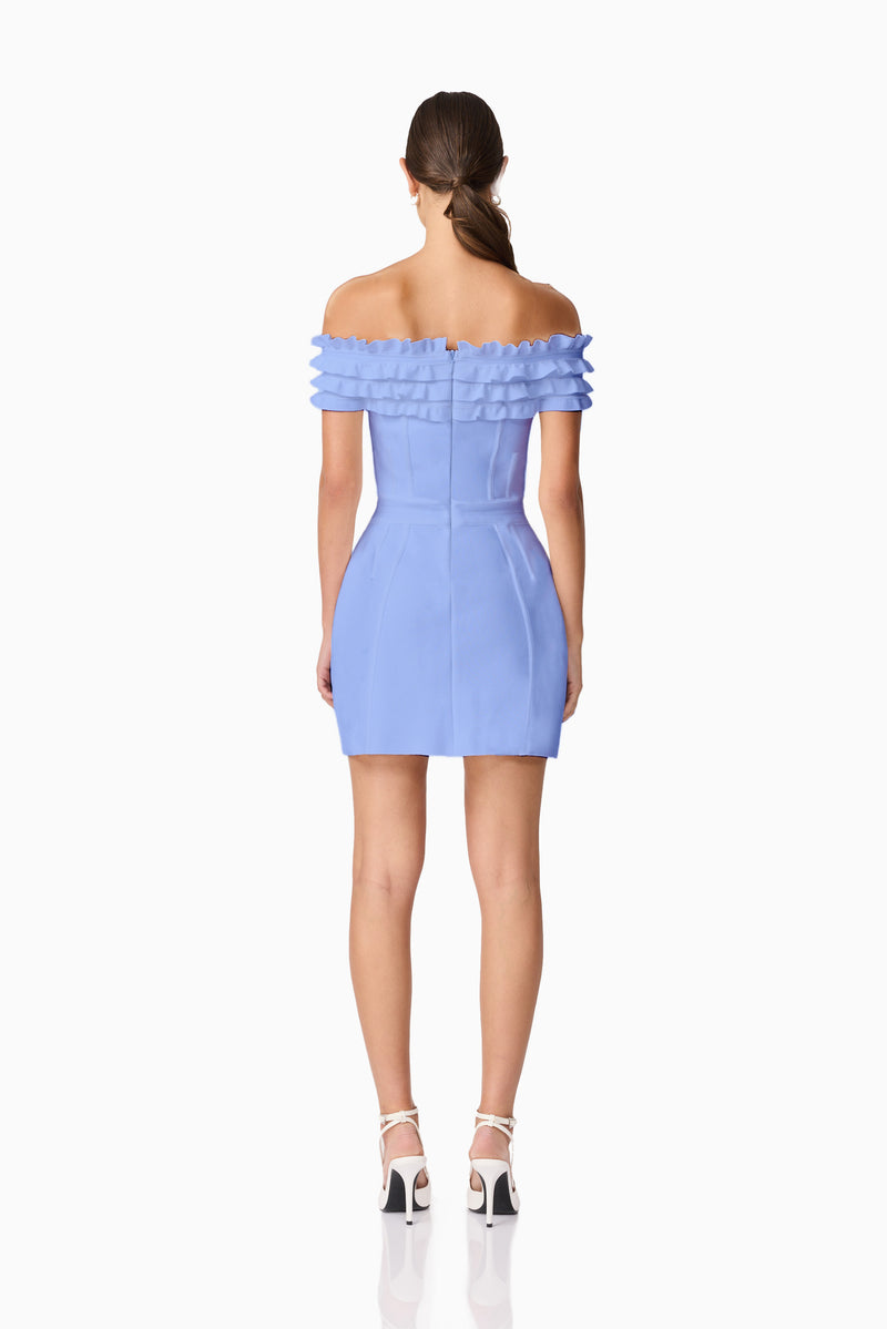 Brunette model wearing Sonya Off The Shoulder Mini Dress in Blue back shot