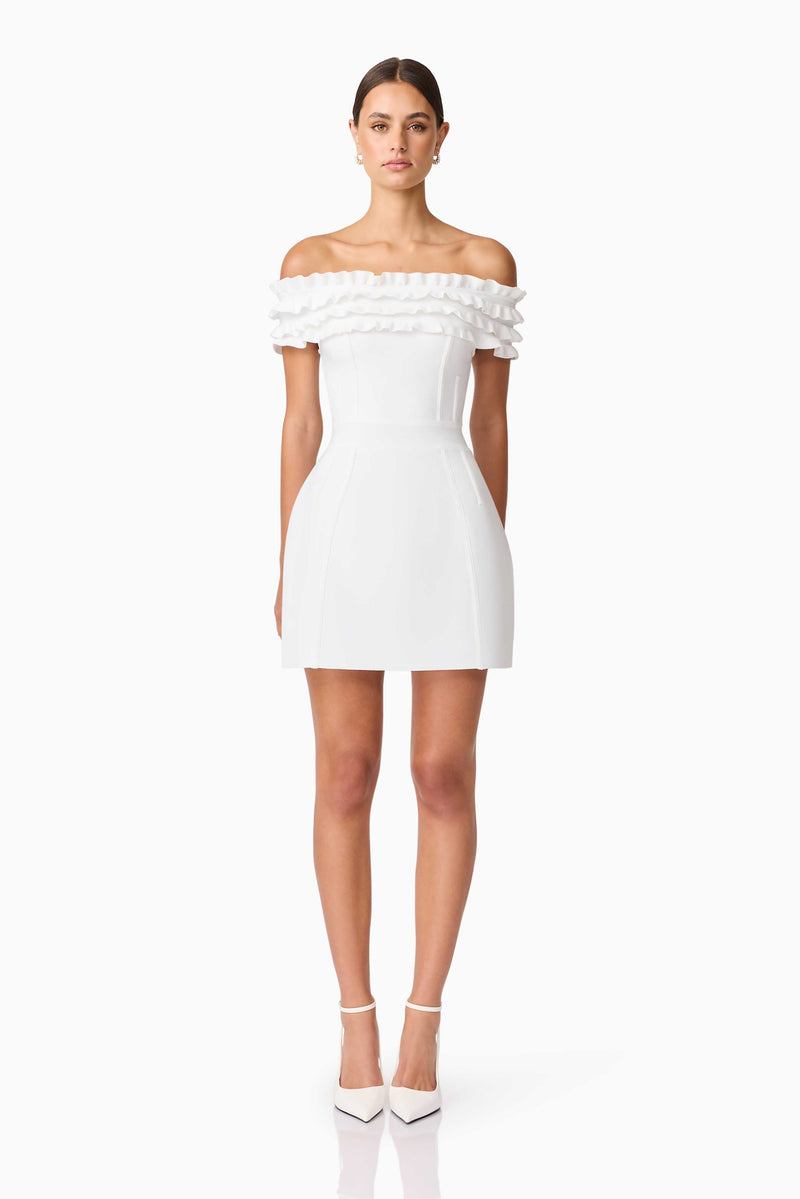 Brunette model wearing Sonya Off The Shoulder Mini Dress in White front shot