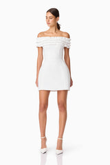 Brunette model wearing Sonya Off The Shoulder Mini Dress in White posed shot