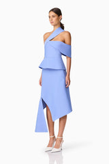 Brunette model wearing Sonya Asymmetrical Set in Blue side shot