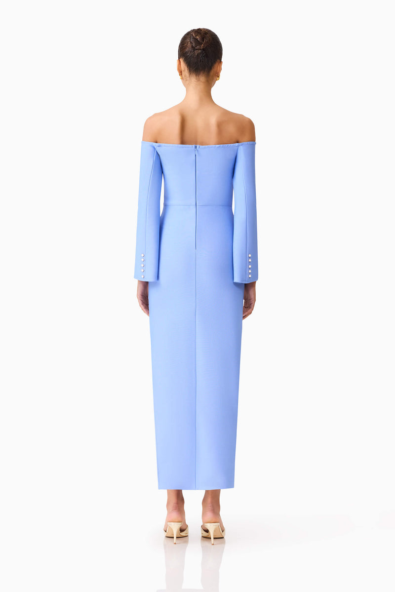Brunette model wearing Sonya Long Sleeve Midi Dress in Blue back shot