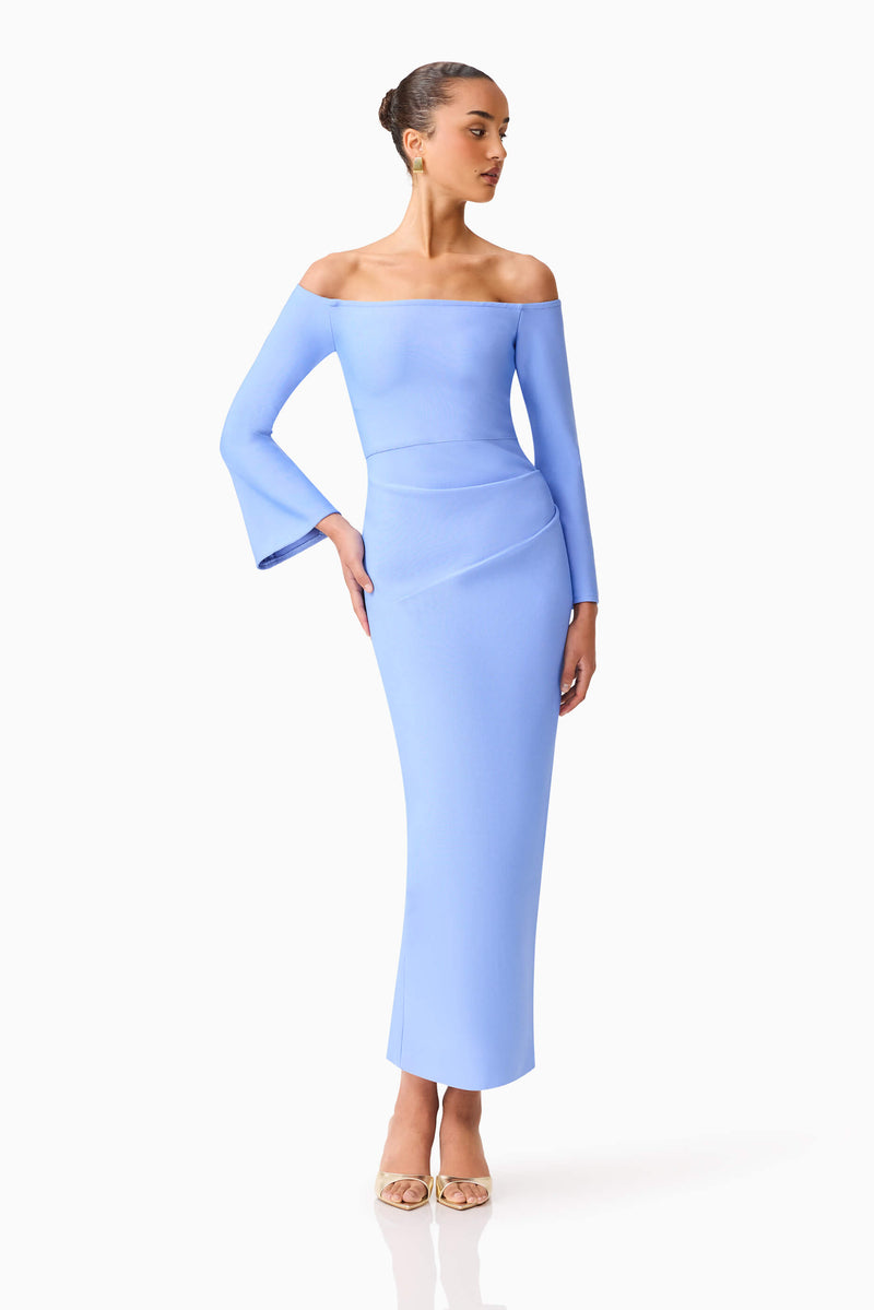 Brunette model wearing Sonya Long Sleeve Midi Dress in Blue front posed  shot