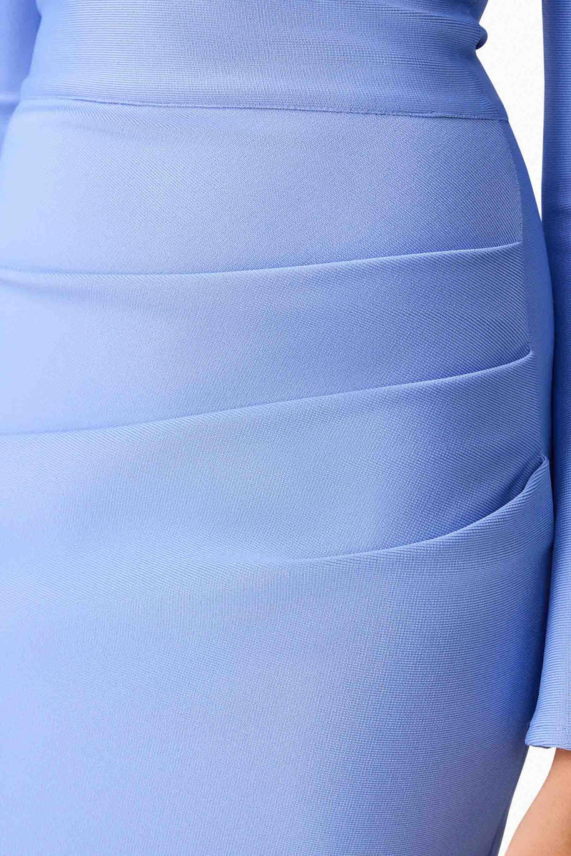 Brunette model wearing Sonya Long Sleeve Midi Dress in Blue detailing shot