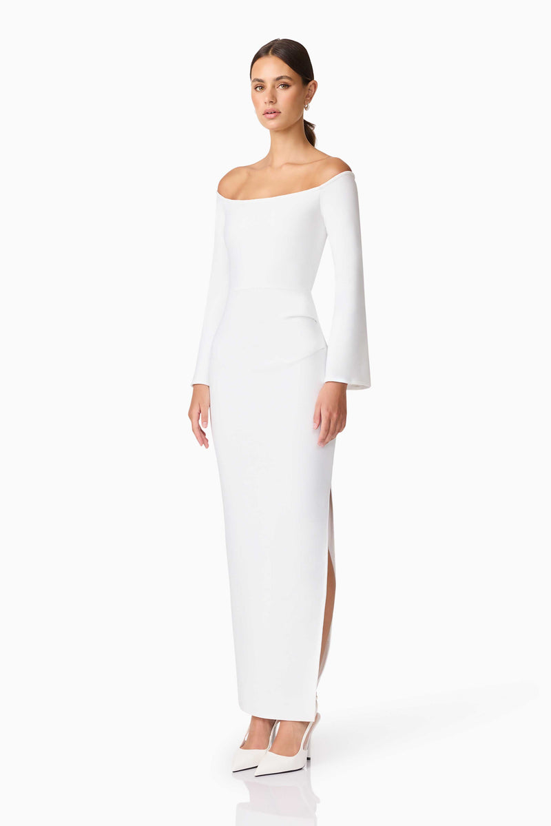 Brunette model wearing Sonya Long Sleeve Midi Dress in White side shot