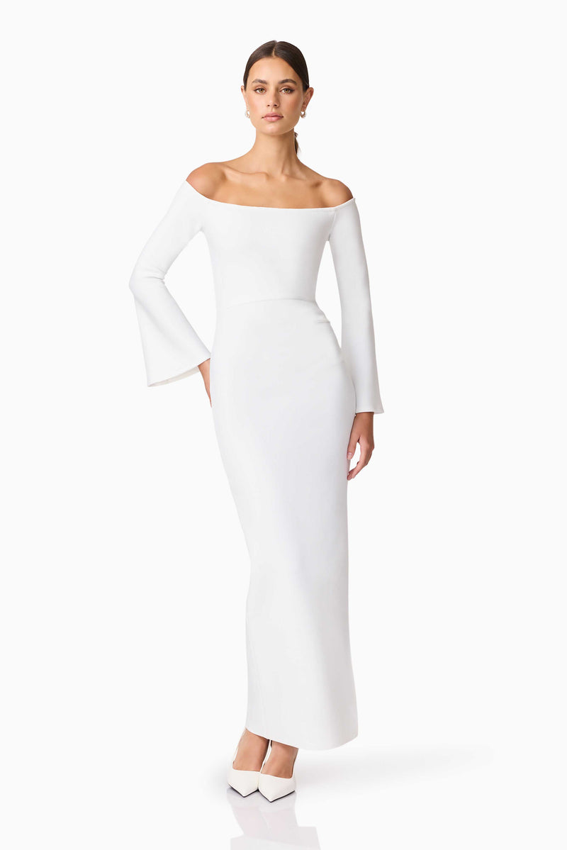 Brunette model wearing Sonya Long Sleeve Midi Dress in White posed shot