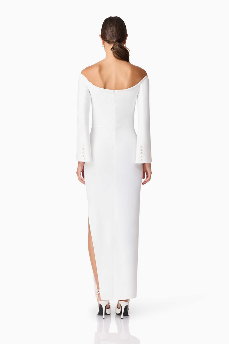 Brunette model wearing Sonya Long Sleeve Midi Dress in White back shot